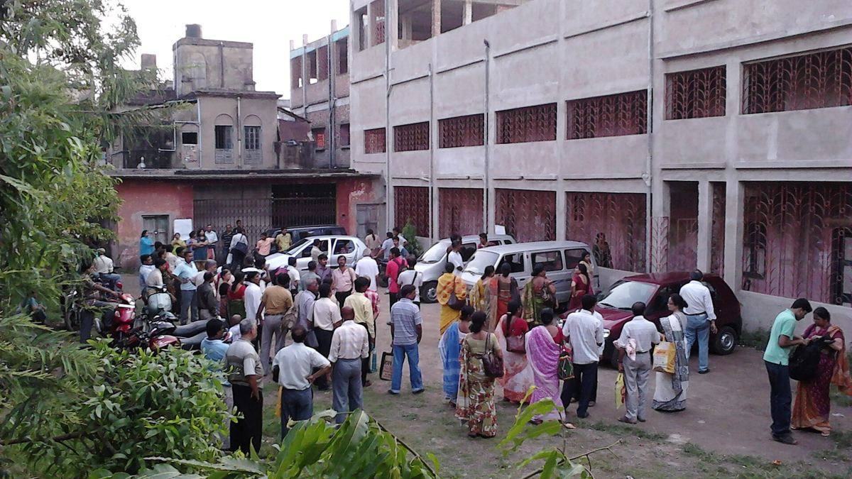 A crowd of candidates gathered at an exam centre gate in Howrah