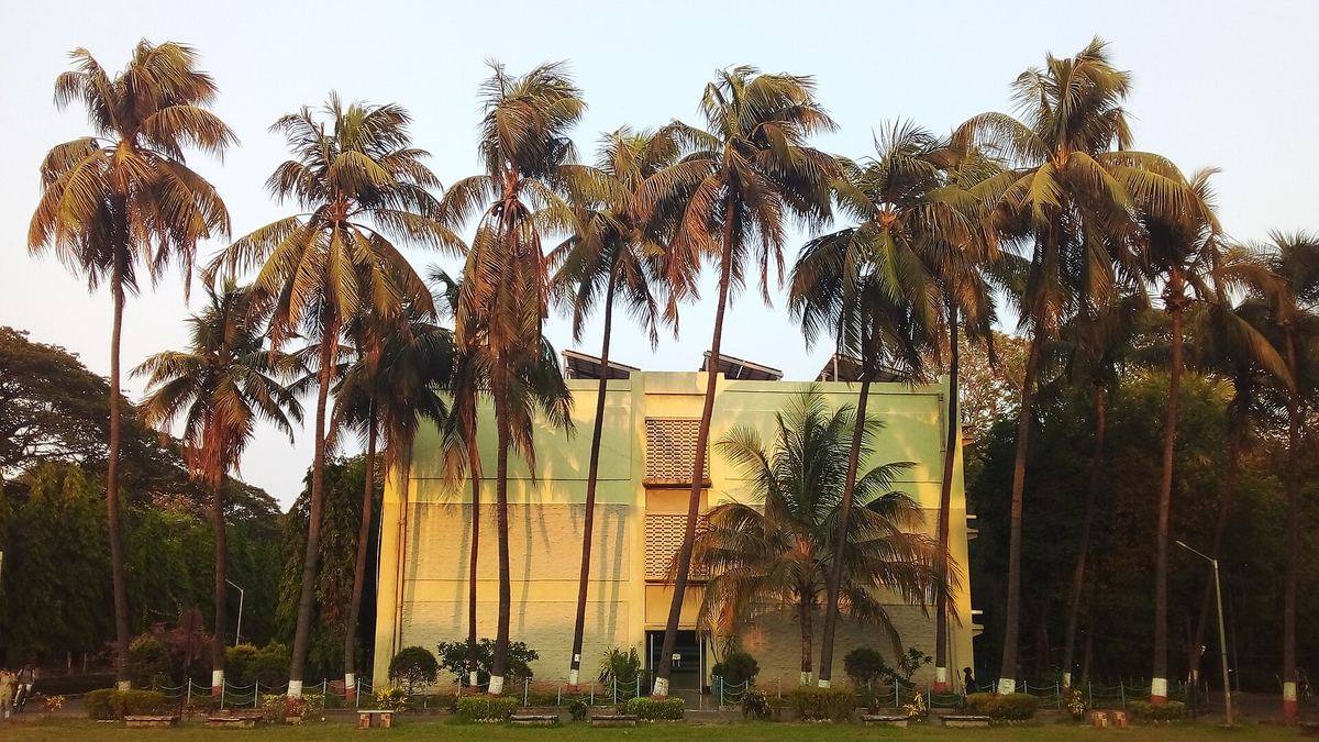The civil engineering building at IIT Bombay among palm trees
