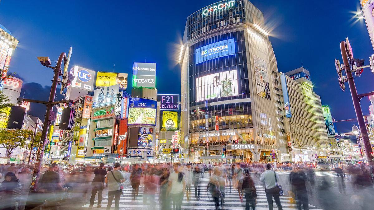 The Shibuya scramble crossing in Tokyo at night